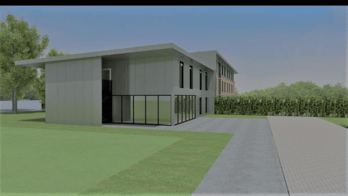 Moderne Firmenzentrale aus Metall mit Glasfassade bei Hahne Holding.